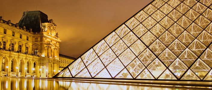 Paris Louvre pyramid by night